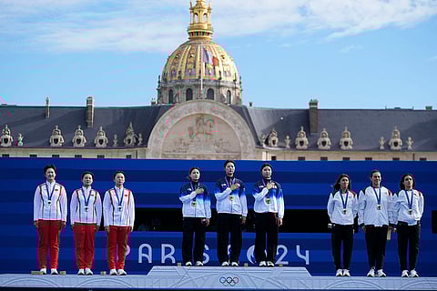 Archery women's team medal ceremony: Silver medal winners, left, China, Gold medal winners, South Korea and Bronze medal winners, Mexico